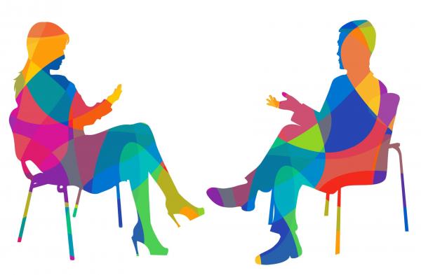 Two folks in Psychotherapy counseling session 